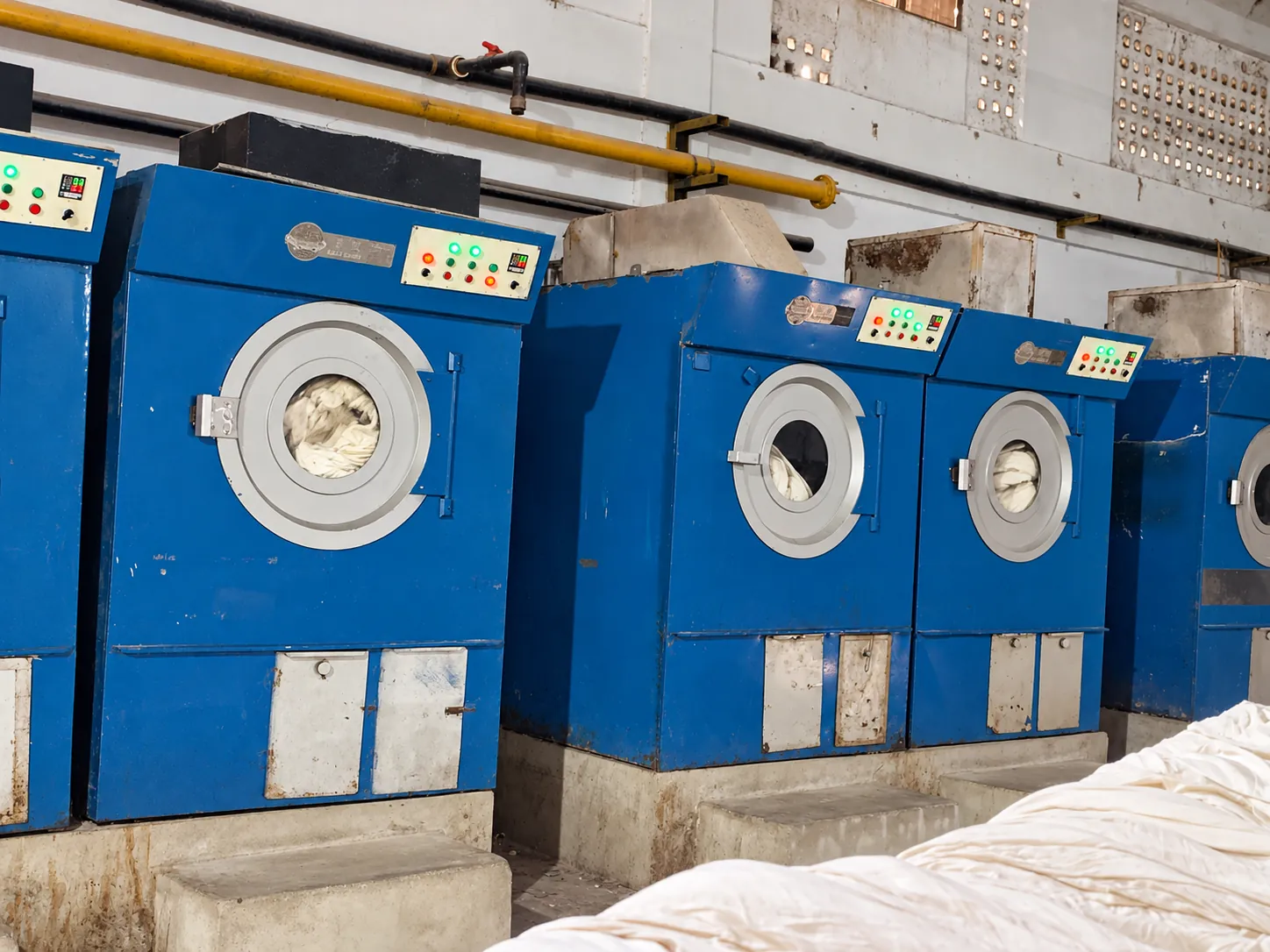Industrial drying machines Row of industrial textile drying machines.